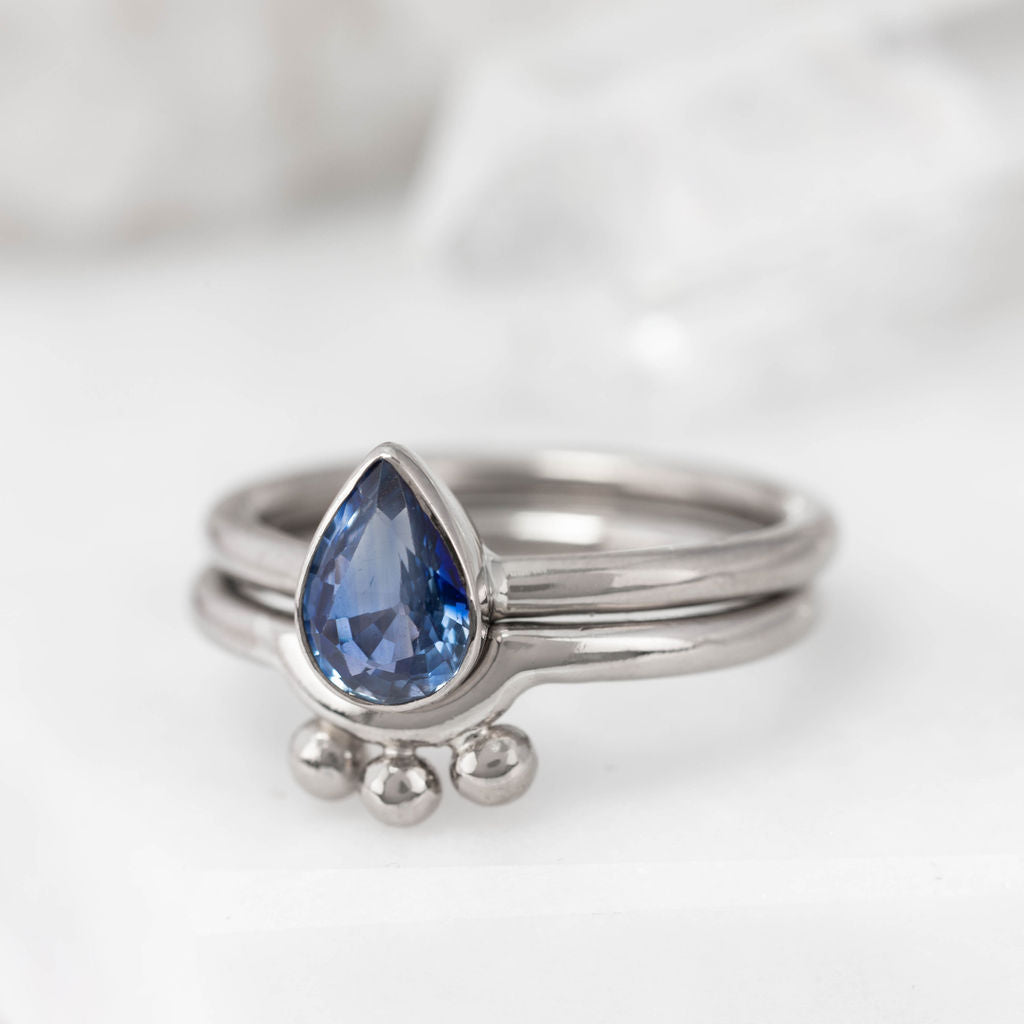 Platinum and Pear Sapphire Nestle Ring