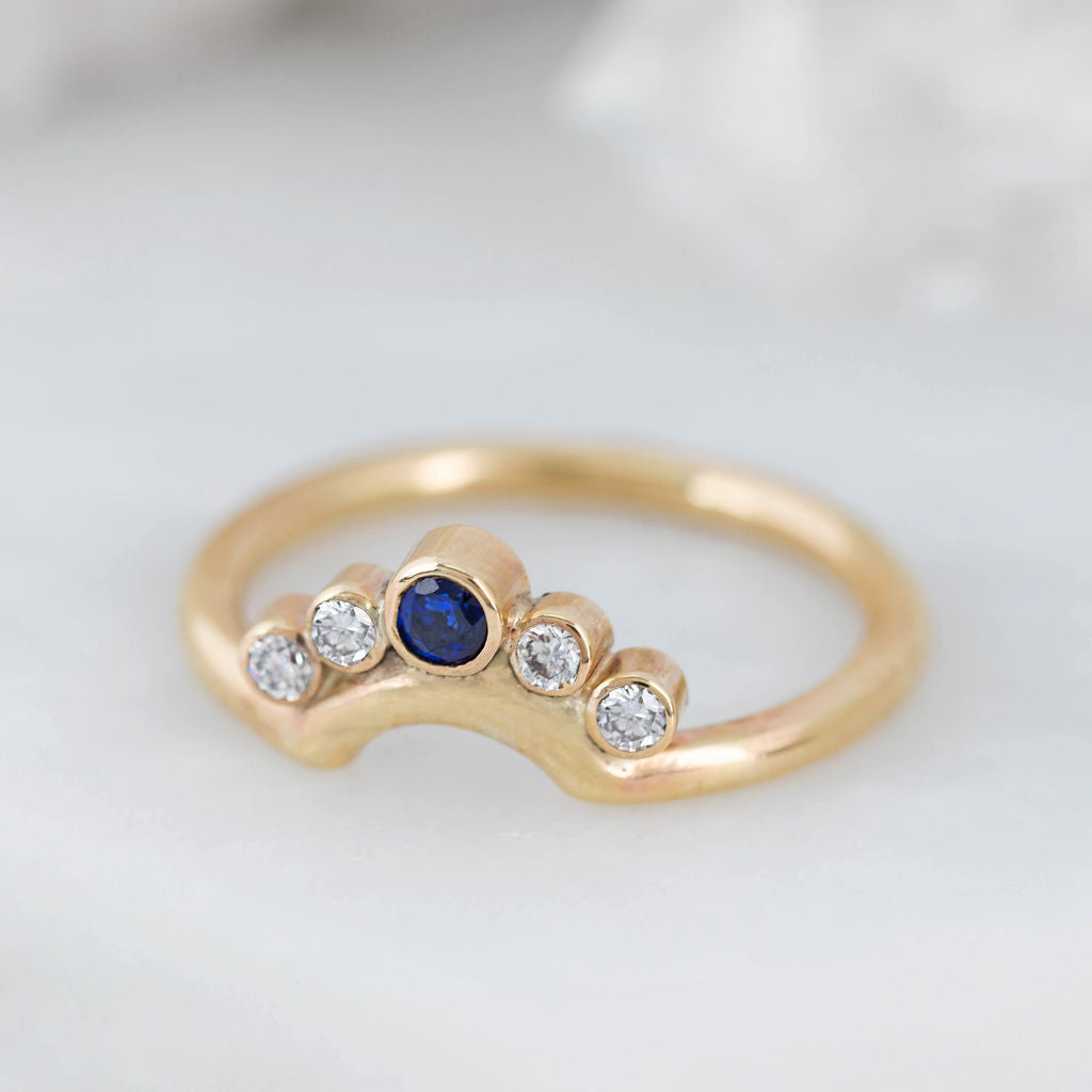 Gold Diamond and Sapphire Nestling Wedding Ring