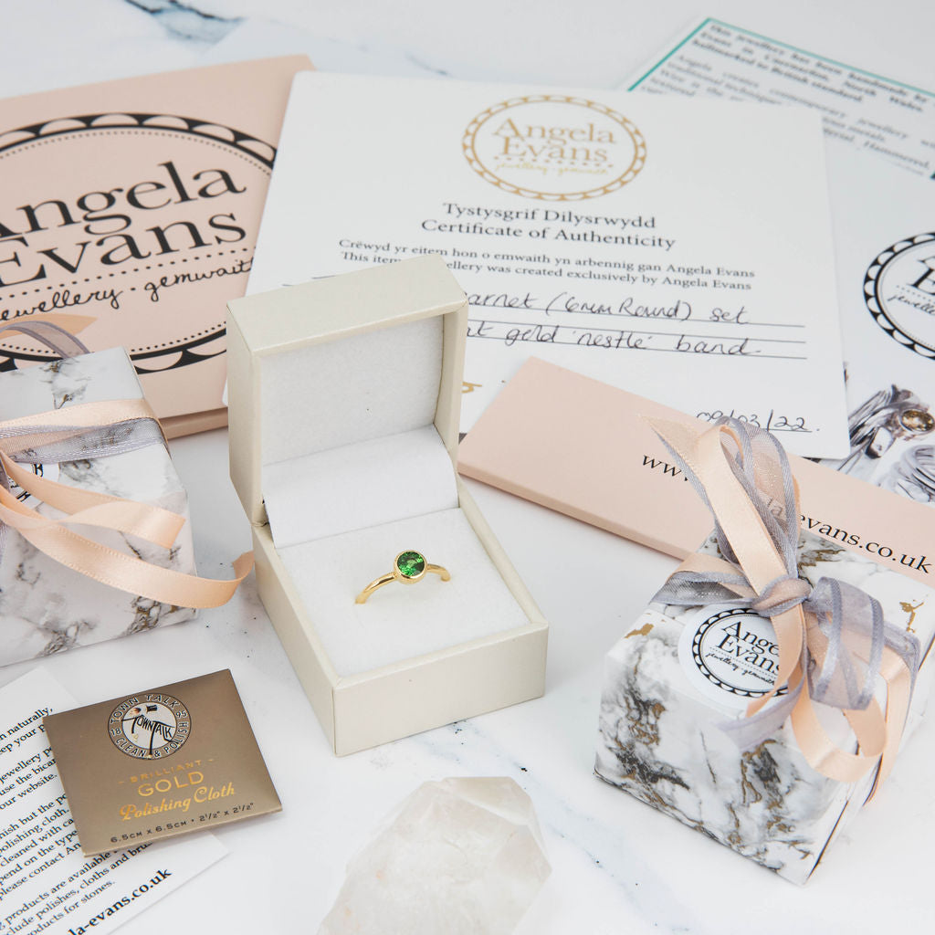 White Gold and Pear Sapphire Nestle Ring