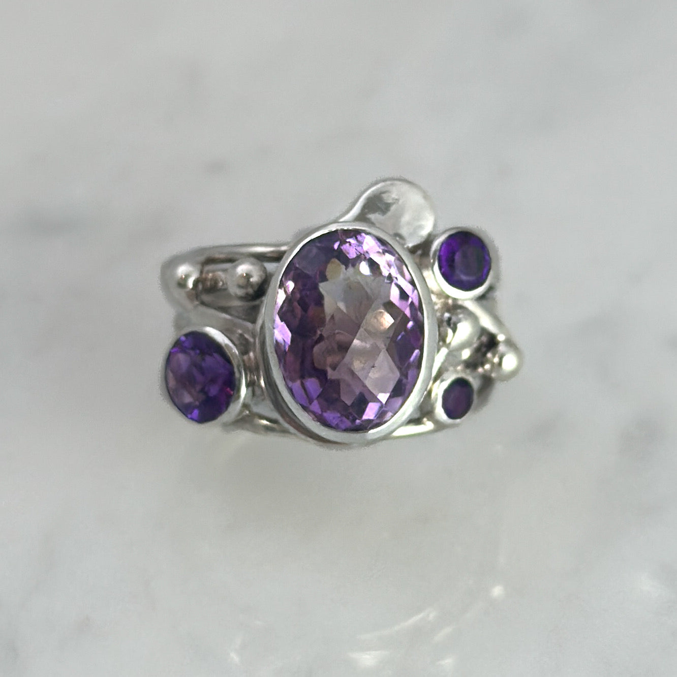 Silver Flowing Ring with Amethyst