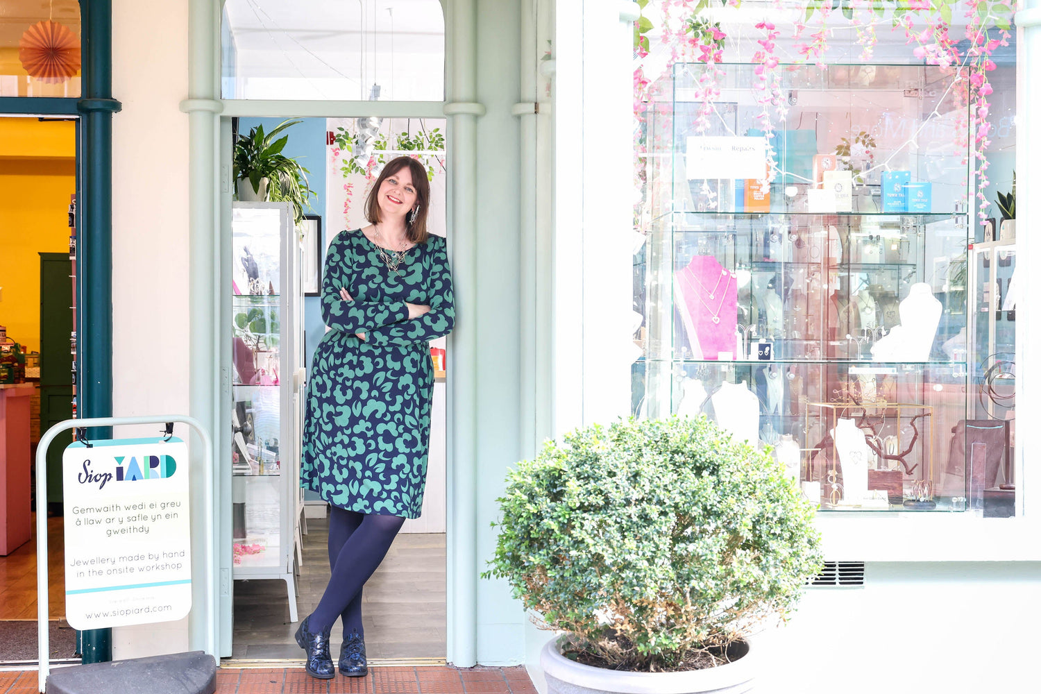 Angela Evans outside Siop iard in Caernarfon.