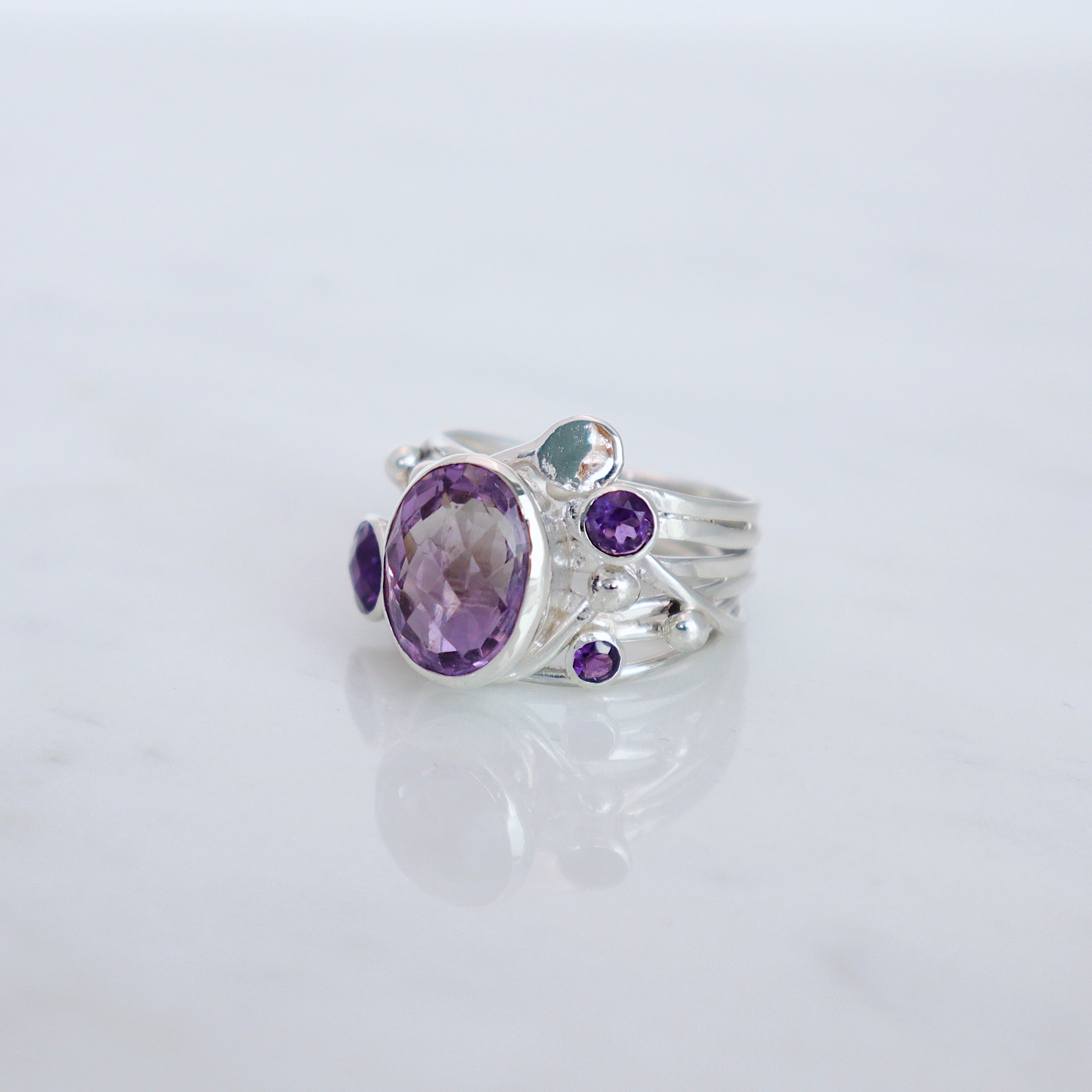 Silver Flowing Ring with Amethyst