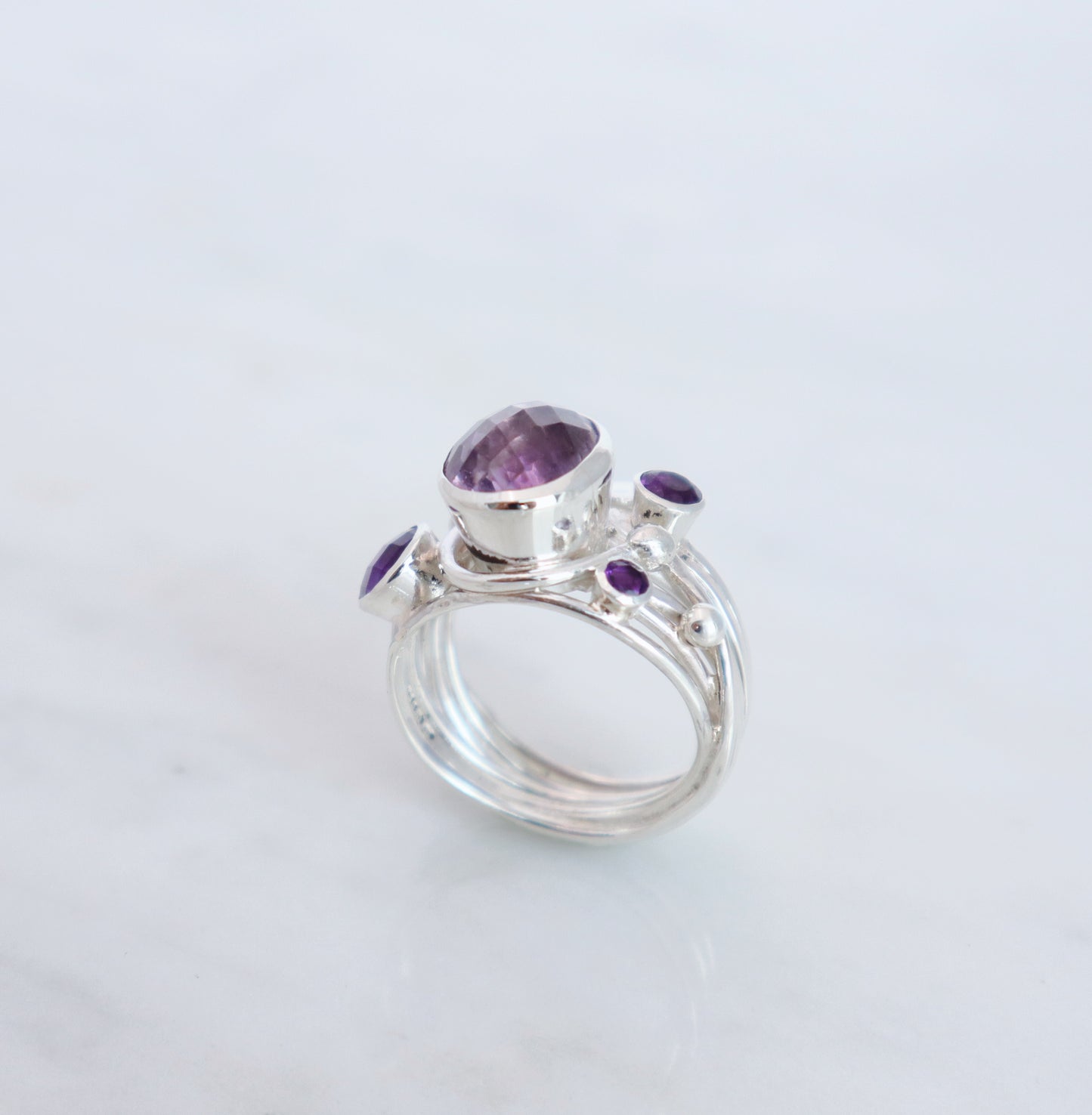 Silver Flowing Ring with Amethyst