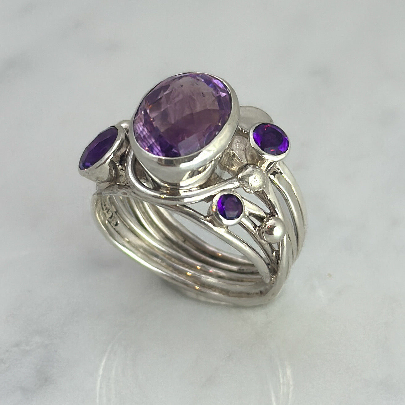 Silver Flowing Ring with Amethyst