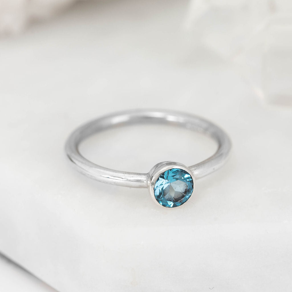 White Gold with Swiss Blue Topaz Nestle Ring