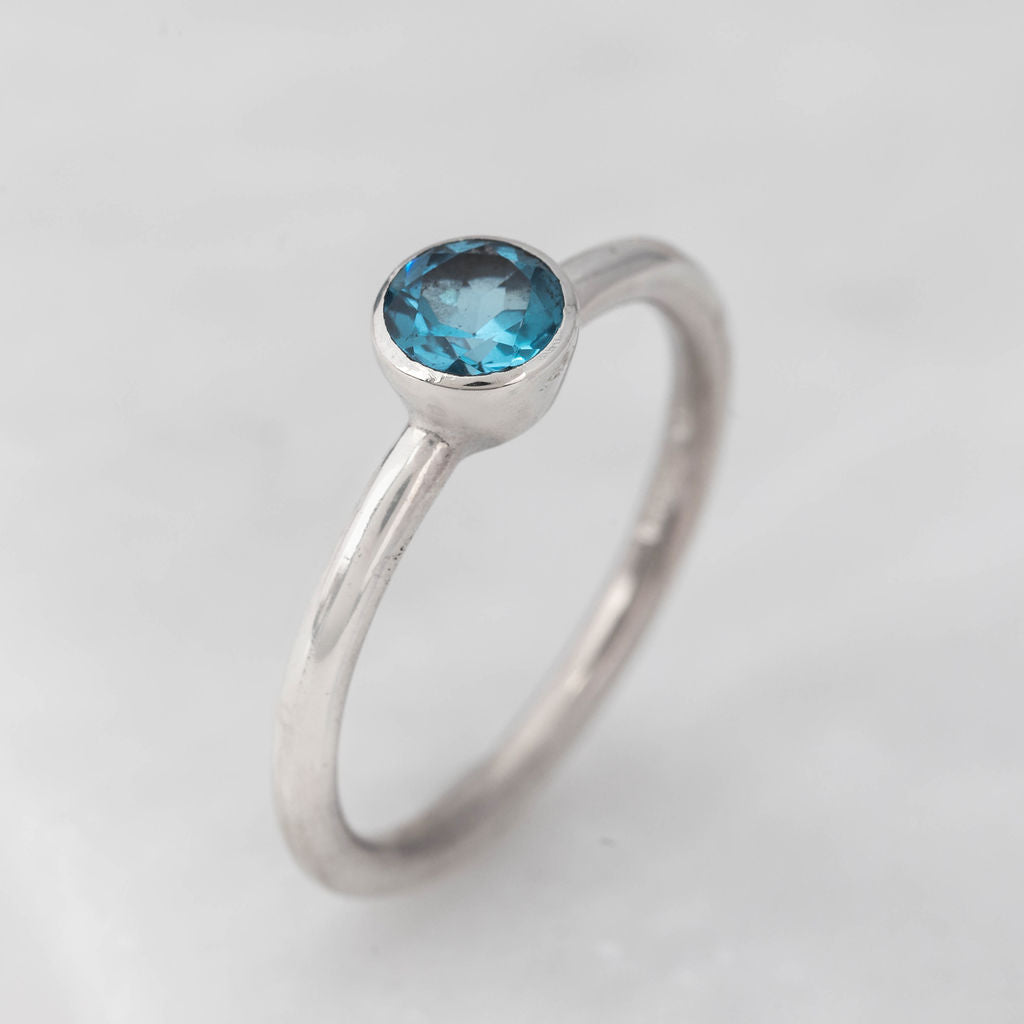 White Gold with Swiss Blue Topaz Nestle Ring