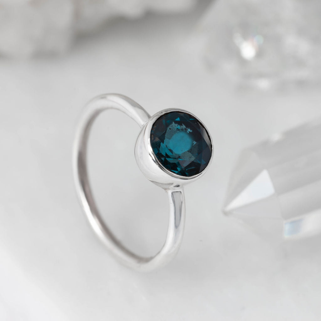 Platinum with London Blue Topaz Nestle Ring