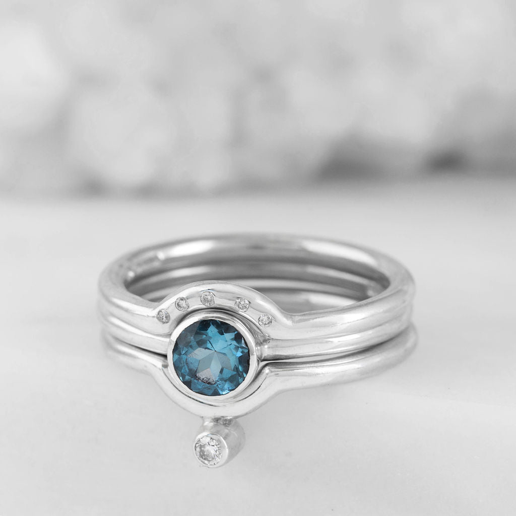 Platinum with Swiss Blue Topaz Nestle Ring