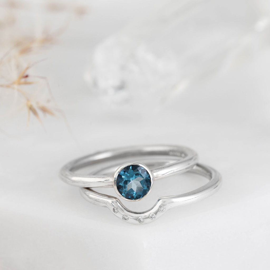 Platinum with Swiss Blue Topaz Nestle Ring