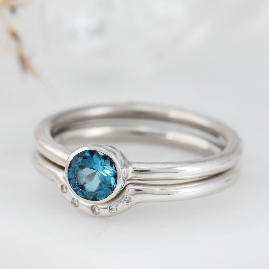 Platinum with Swiss Blue Topaz Nestle Ring