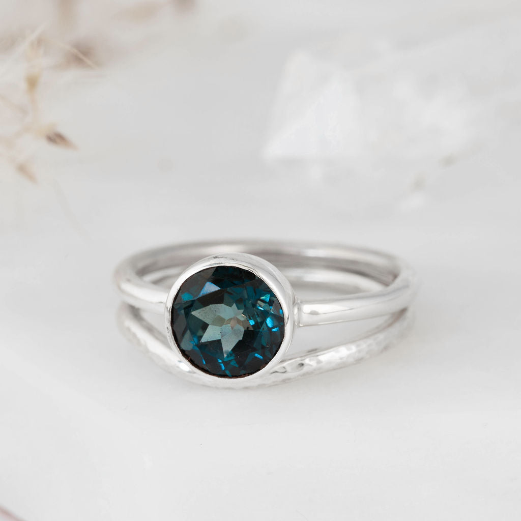 Platinum with London Blue Topaz Nestle Ring