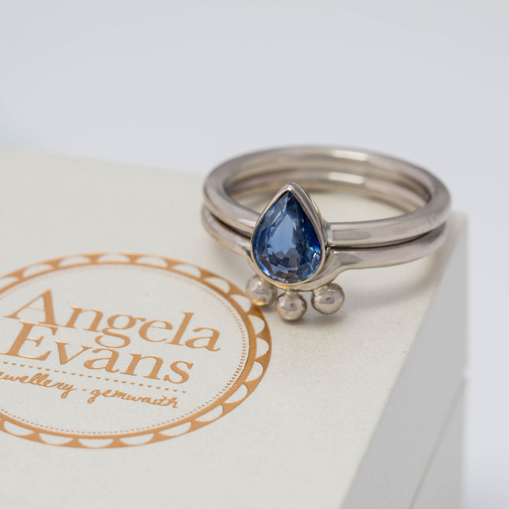 White Gold and Pear Sapphire Nestle Ring