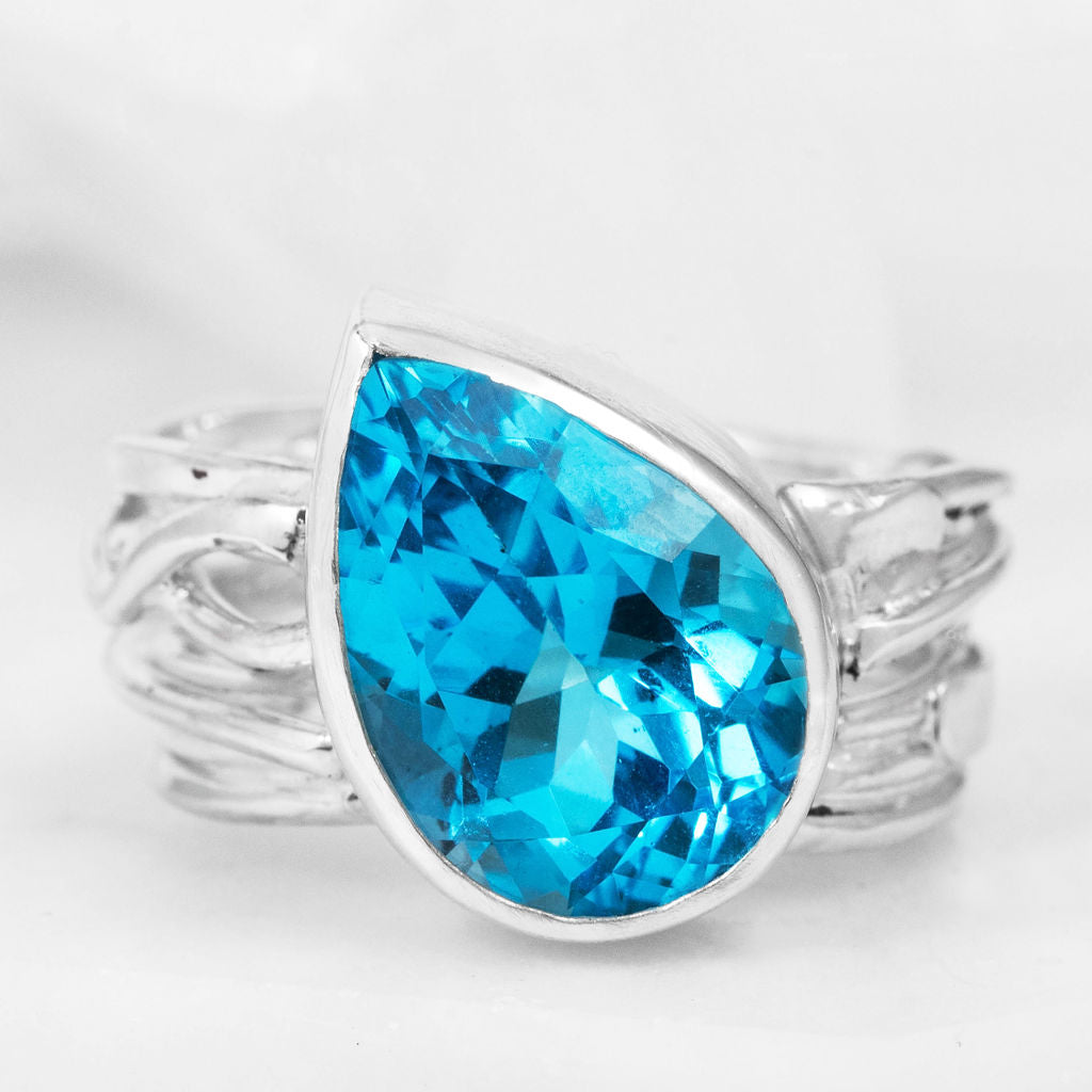 Silver Flowing Ring with Swiss Blue Topaz