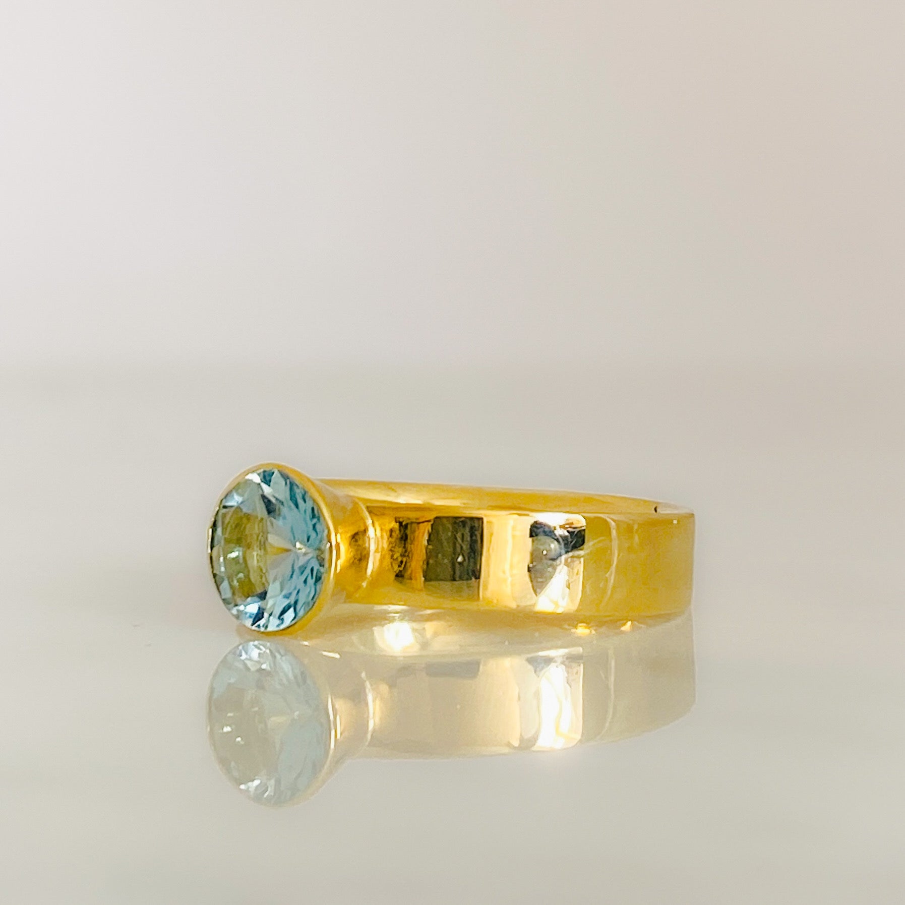 Gold and Aquamarine Serendipity Engagement Ring
