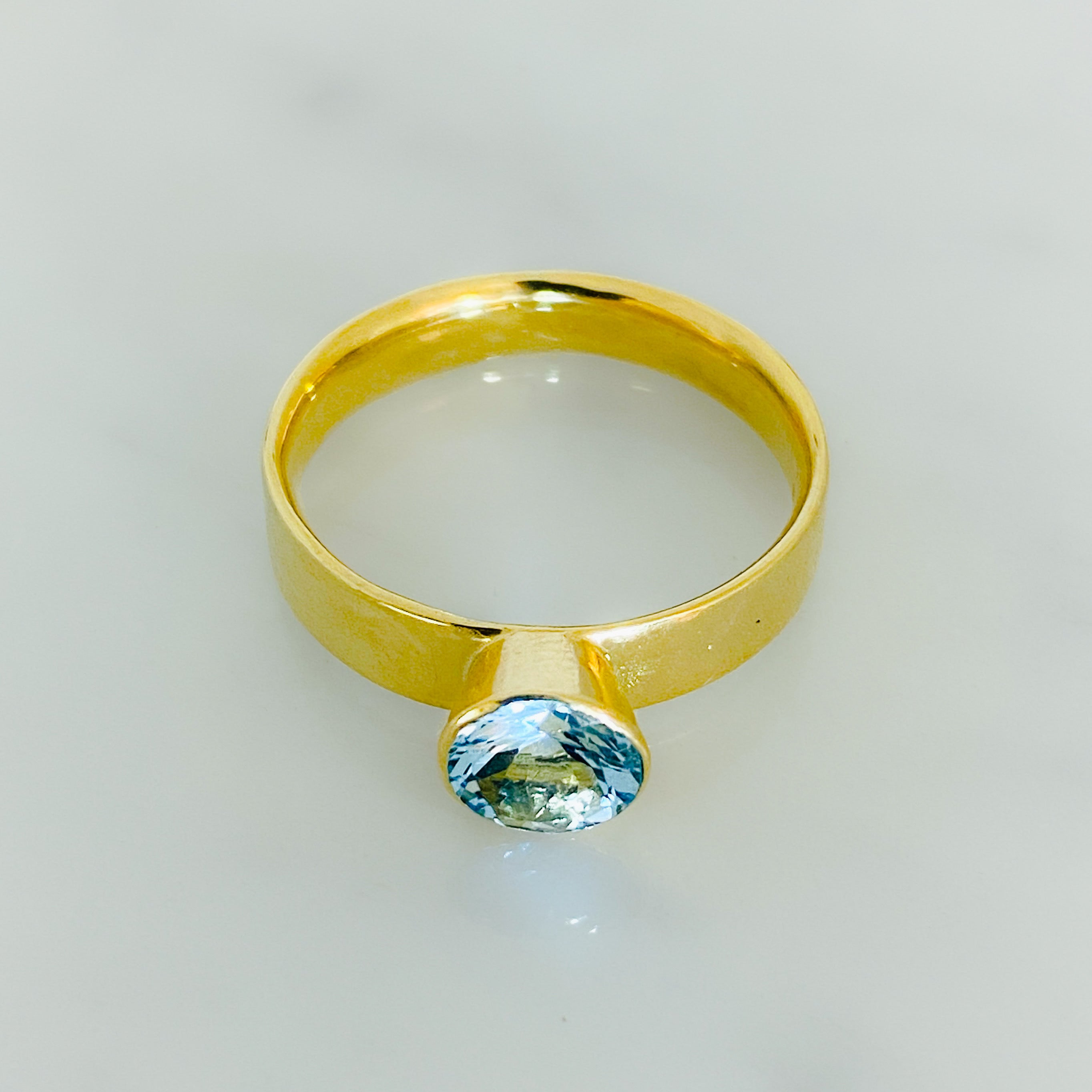 Gold and Aquamarine Serendipity Engagement Ring